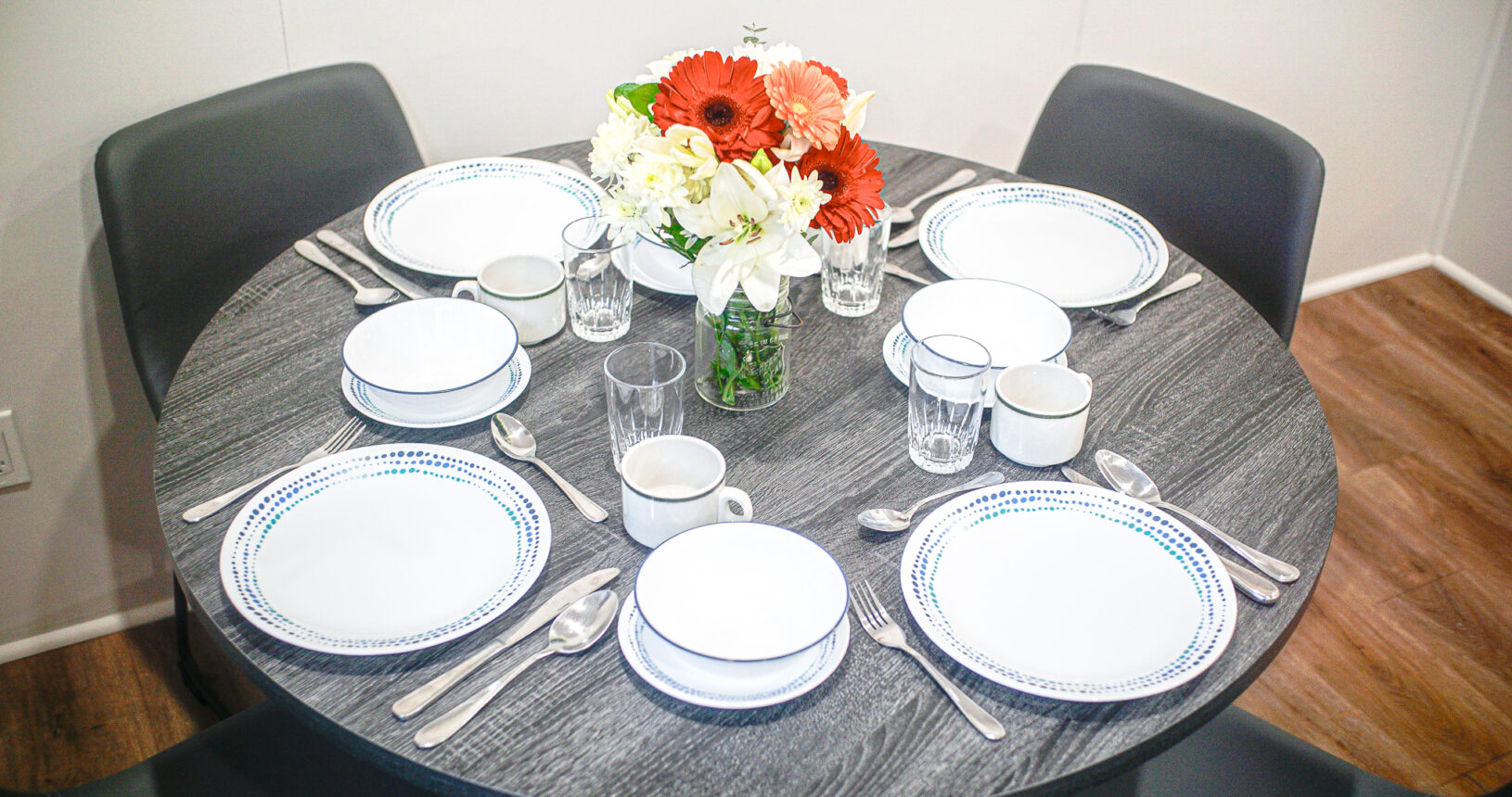 Dining Table with Dishes and Cutlery